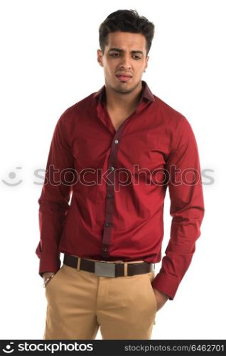 Handsome young Indian man with an upset expression