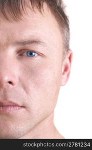 Handsome young man&acute;s face. Close up portrait on white background