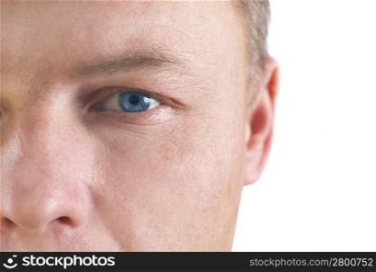 Handsome young man&acute;s face. Close up portrait on white background