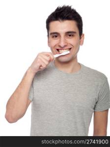 handsome young man brushing his teeth with toothbrush (isolated on white background)