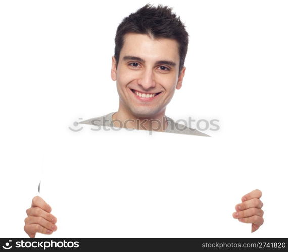 handsome young man displaying a banner ad isolated on white background