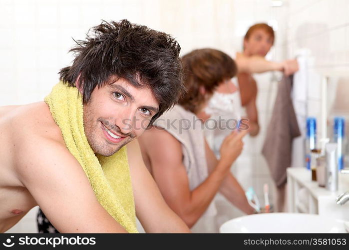 Handsome young man getting ready with his mates