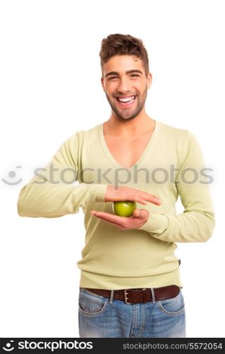 Handsome young man holding a green apple - diet / nutrition concept