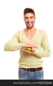 Handsome young man holding a green apple - diet / nutrition concept