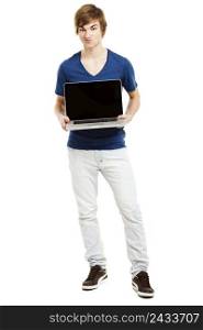 Handsome young man holding a laptop isolated over a white background