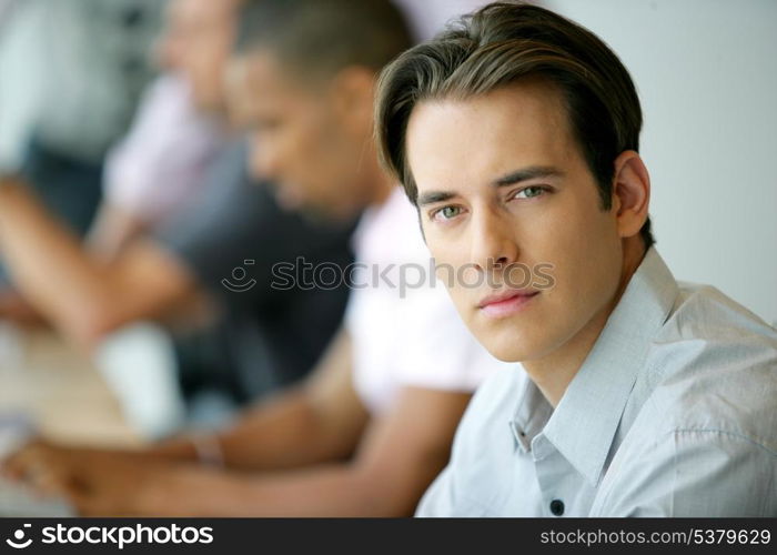 Handsome young man in an office environment