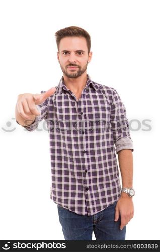 Handsome young man pointing at you, isolated over white background
