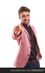 Handsome young man pointing at you, isolated over white background