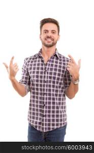 Handsome young man signaling ok, isolated over a white background