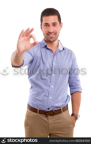 Handsome young man signaling ok, isolated over a white background