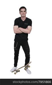 Handsome young man skateboarder with his skateboard