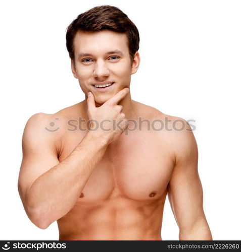 Handsome young man sniffing his armpit isolated on white. Handsome young man sniffing his armpit