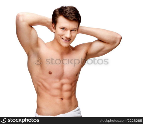 Handsome young man sniffing his armpit isolated on white. Handsome young man sniffing his armpit