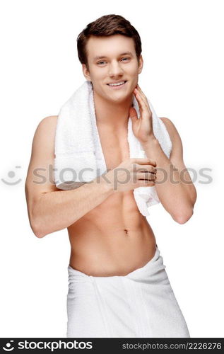 Handsome young man sniffing his armpit isolated on white. Handsome young man sniffing his armpit