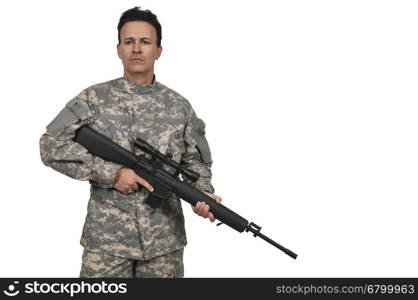 Handsome young man soldier with a rifle