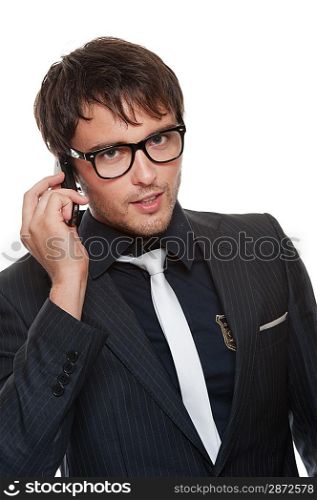 Handsome young man talking on a phone.