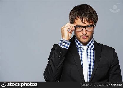 Handsome young man wearing glasses.
