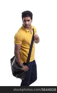Handsome young man with duffel bag