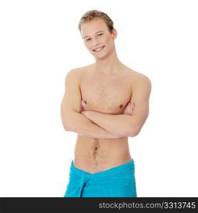 Handsome, young, naked man with the towel around his waist. Isolated on white