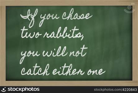 handwriting blackboard writings - If you chase two rabbits, you will not catch either one