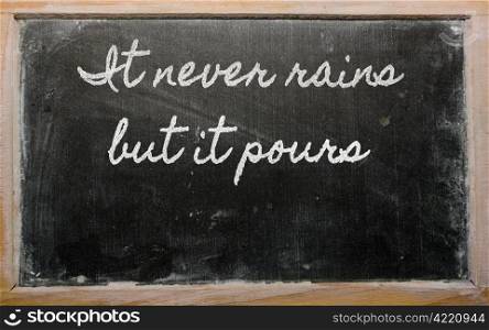 handwriting blackboard writings - It never rains but it pours