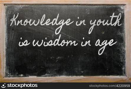 handwriting blackboard writings - Knowledge in youth is wisdom in age