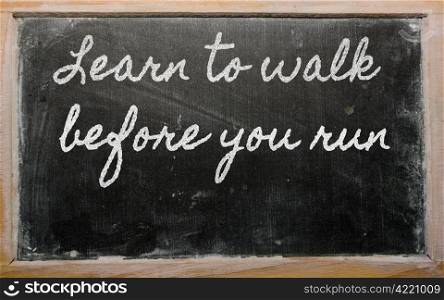 handwriting blackboard writings - Learn to walk before you run