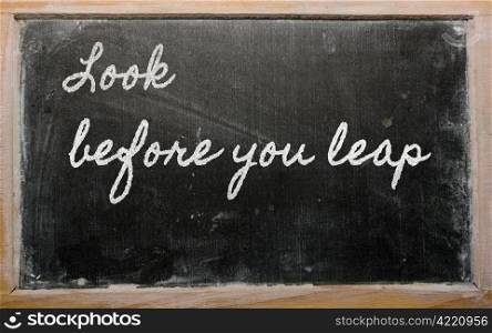 handwriting blackboard writings - Look before you leap