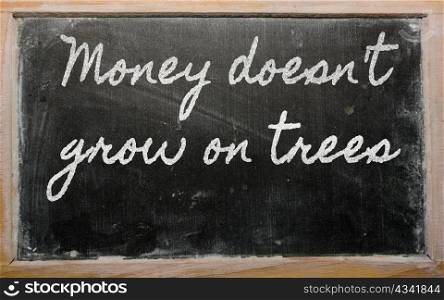 handwriting blackboard writings - Money doesn&rsquo;t grow on trees