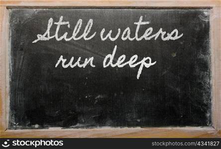handwriting blackboard writings - Still waters run deep