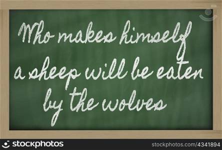 handwriting blackboard writings - Who makes himself a sheep will be eaten by the wolves