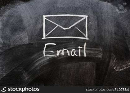 Handwriting of Email with an Envelope on a blackboard