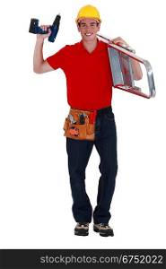 Handyman carrying ladder to next job