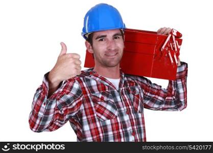 Handyman carrying tool box