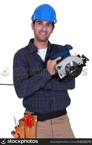 Handyman holding a circular saw.