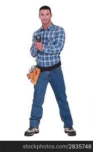 Handyman holding a cordless powerdrill