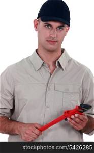 Handyman holding a wrench
