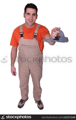Handyman holding tool