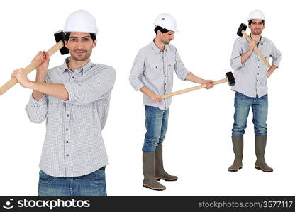 Handyman posing with a sledge hammer