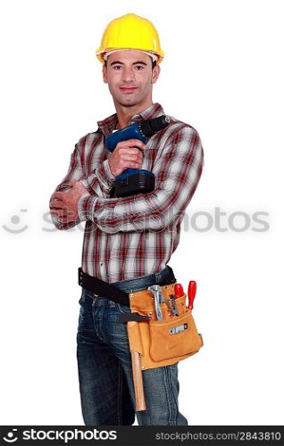 Handyman posing with cordless drill