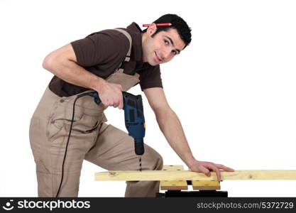 Handyman using a power tool