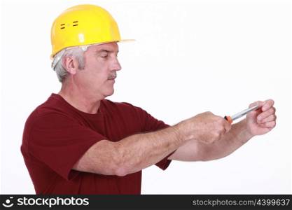 Handyman using screwdriver