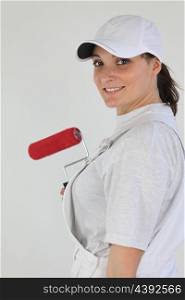 handywoman painting a wall
