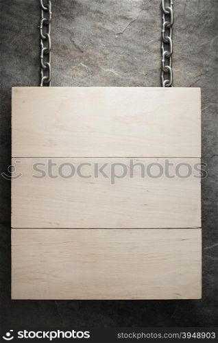 hanging signboard at wall background