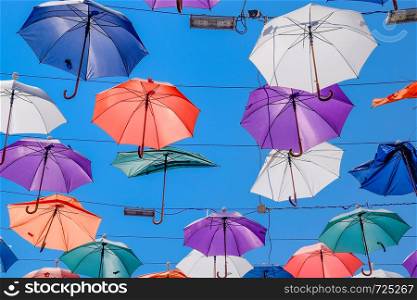 hanging umbrellas against the blue sky, walk through the streets of Kaleici, Antalya, Turkey.. hanging umbrellas against the blue sky, walk through the streets of Kaleici, Antalya