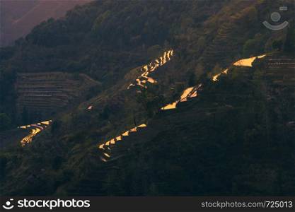 Hani Terraced rice fields of YuanYang, China during the golden hour