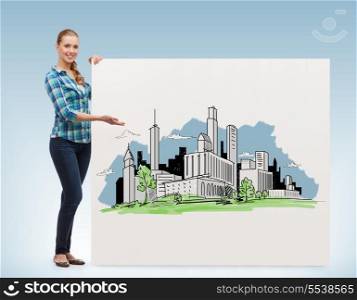 happiness, advertising and people concept - smiling young woman pointing hand to white board with city drawing