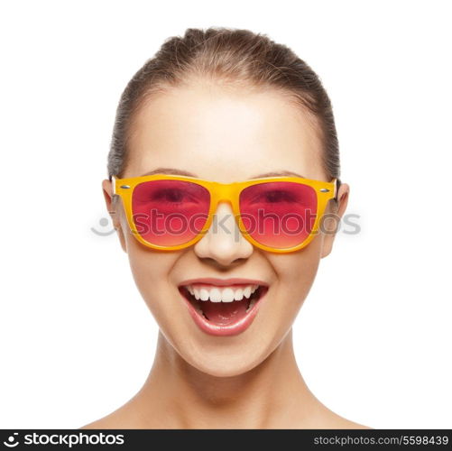 happiness and people concept - portrait of happy teenage girl in shades