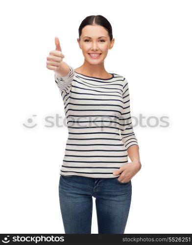 happiness and people concept - smiling girl in casual clothes showing thumbs up