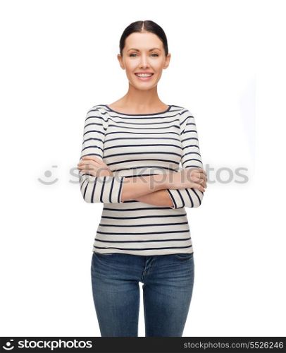 happiness and people concept - smiling girl in casual clothes with crossed arm